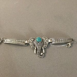 Silver elephant bracelet with turquoise stone